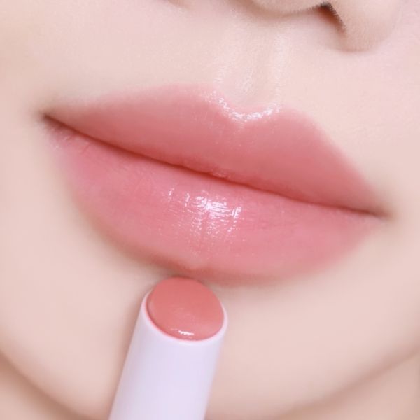 Тінт - волюмайзер для губ Glow Melting Balm PEACH MOMENT DF-054 фото